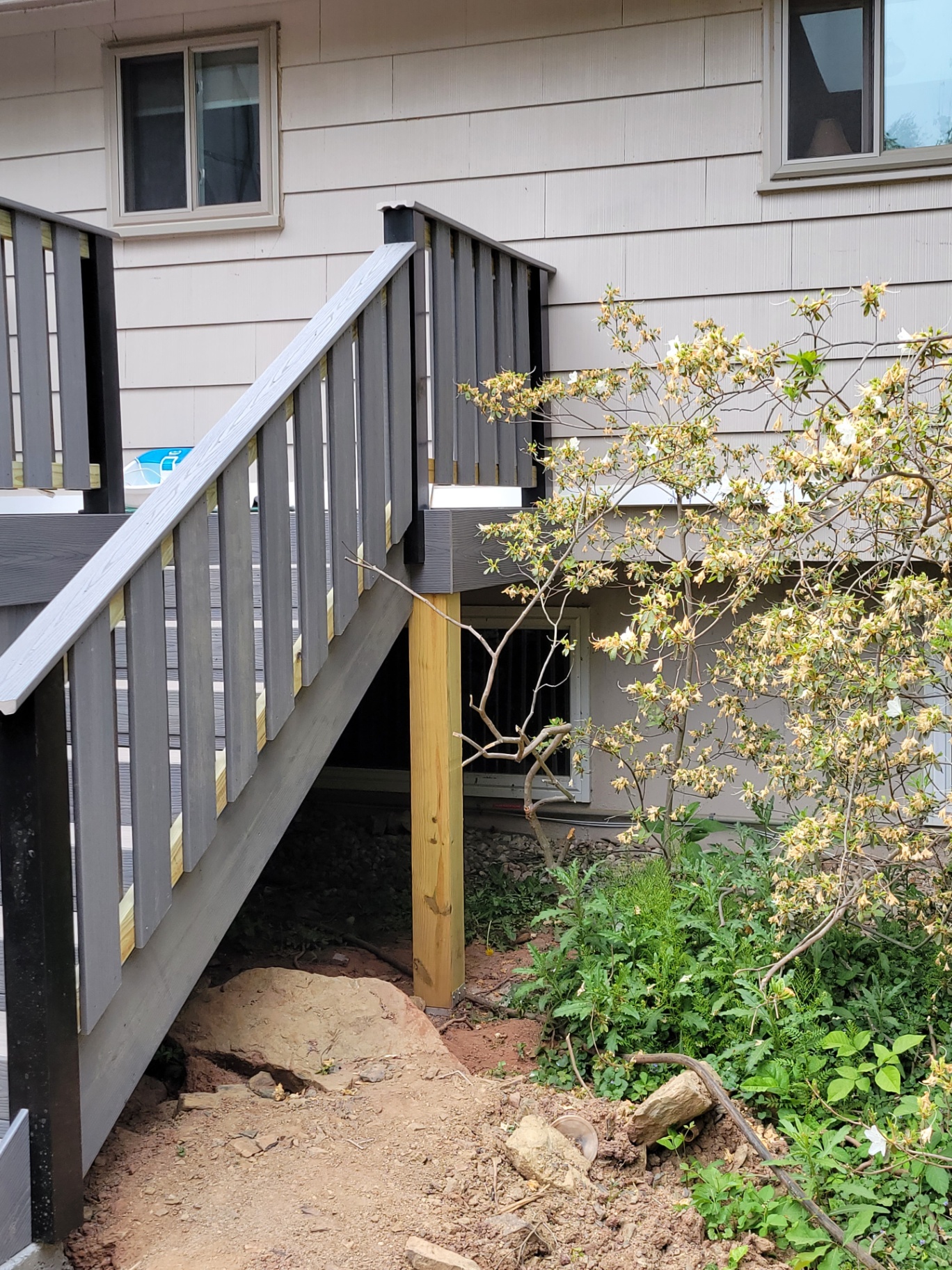 Composite stairs leading down to backyard