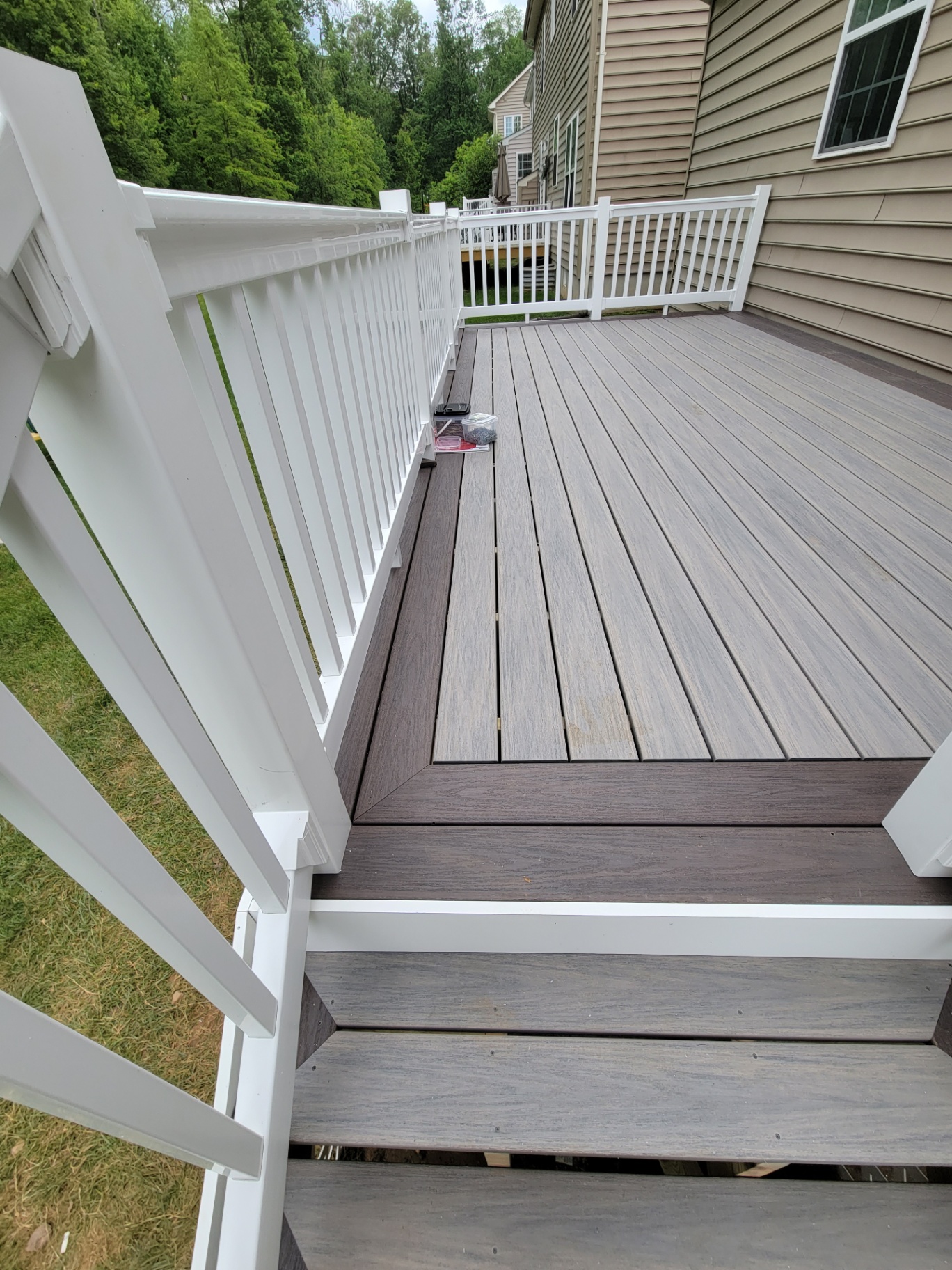 Two-tone composite deck with white railings