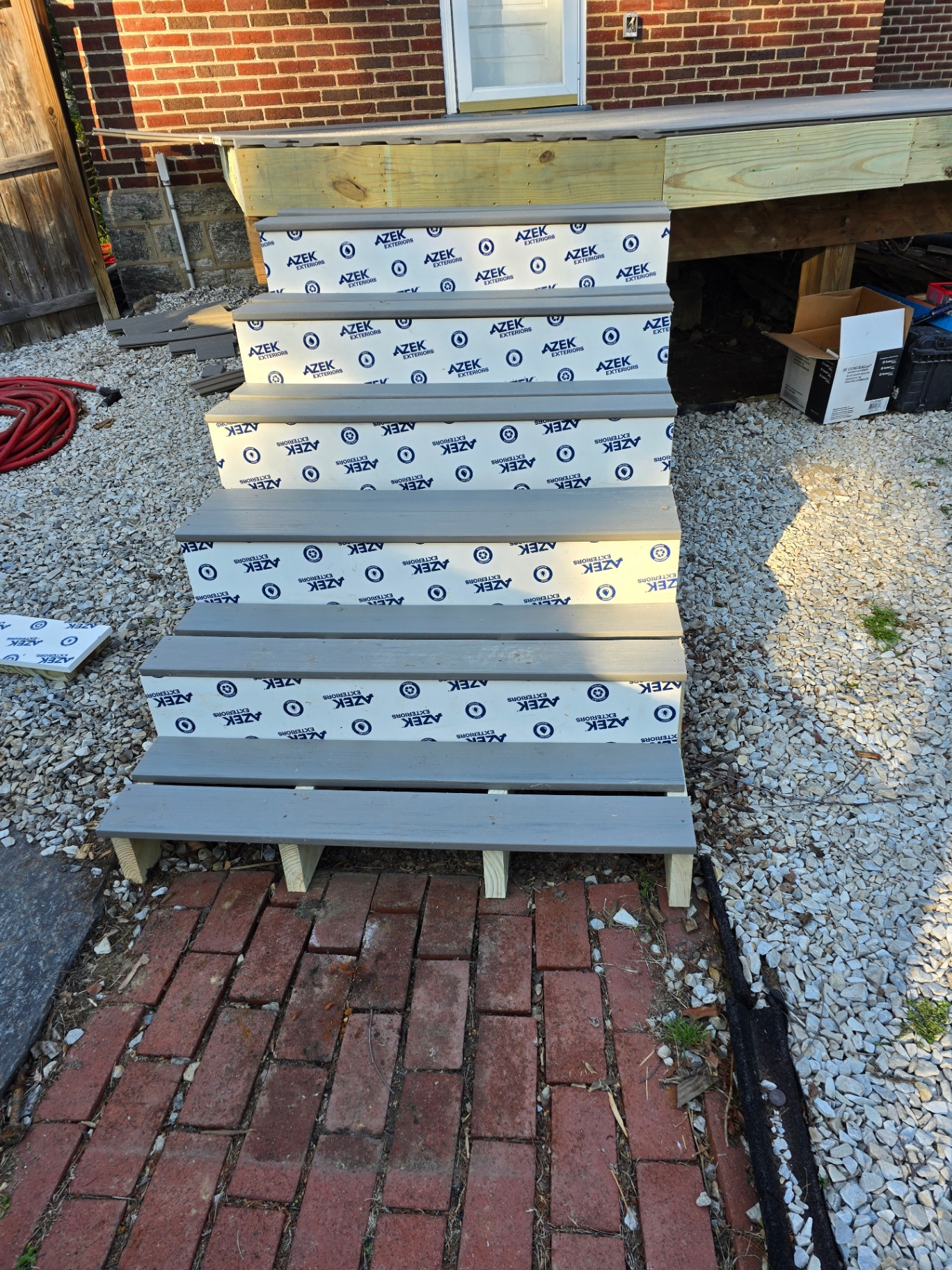 AZEK composite stairs with gray treads and white risers