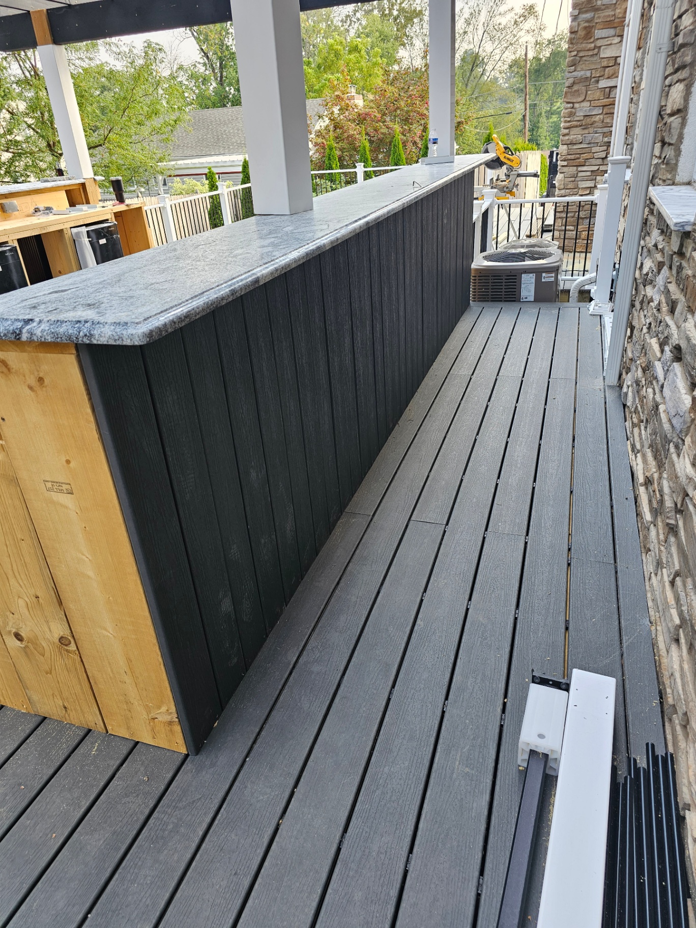 Custom outdoor bar with granite countertop
