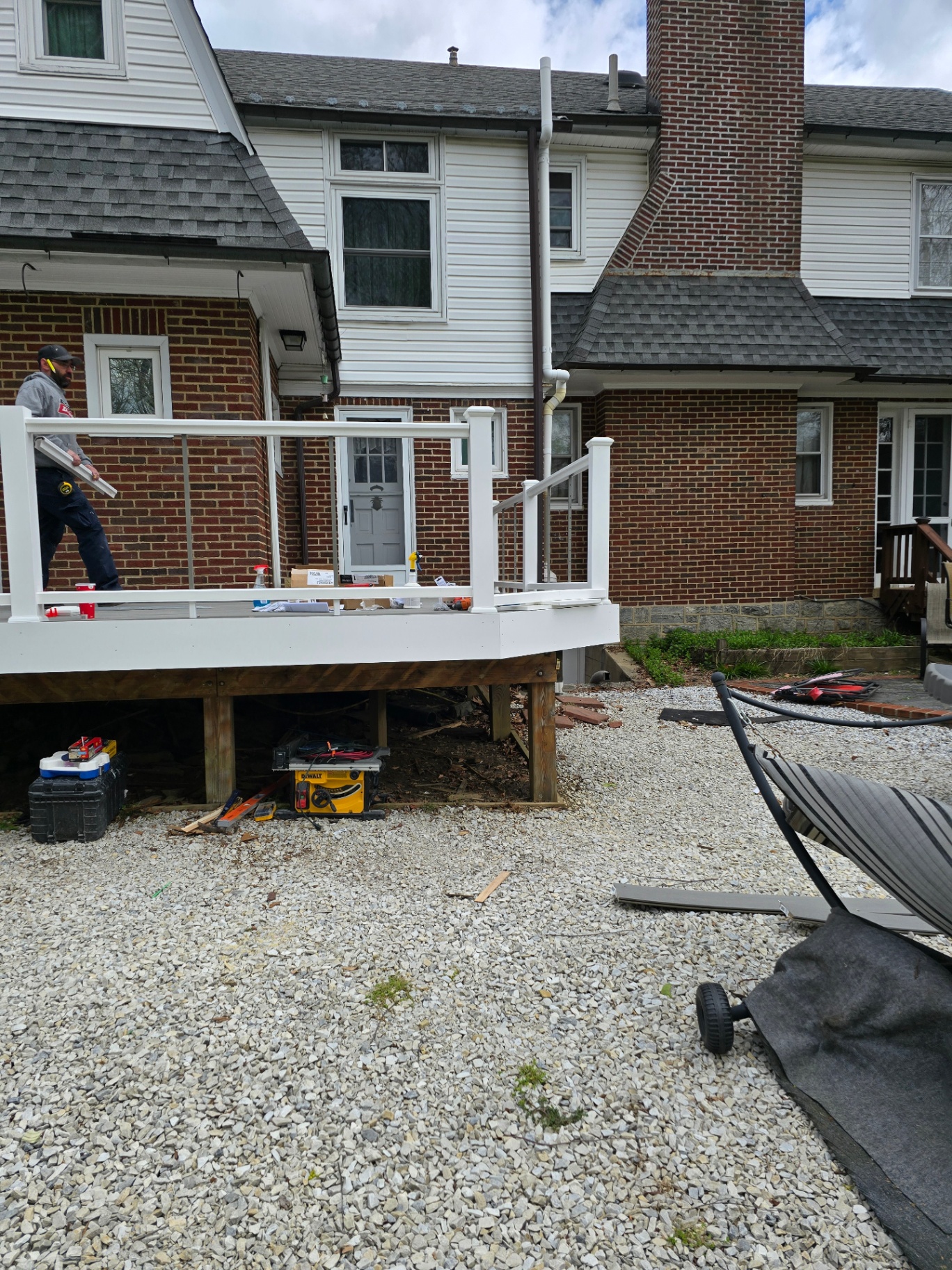 Cable railing installation on elevated composite deck